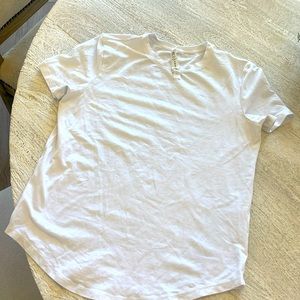Lululemon clean, white fitted t-shirt.